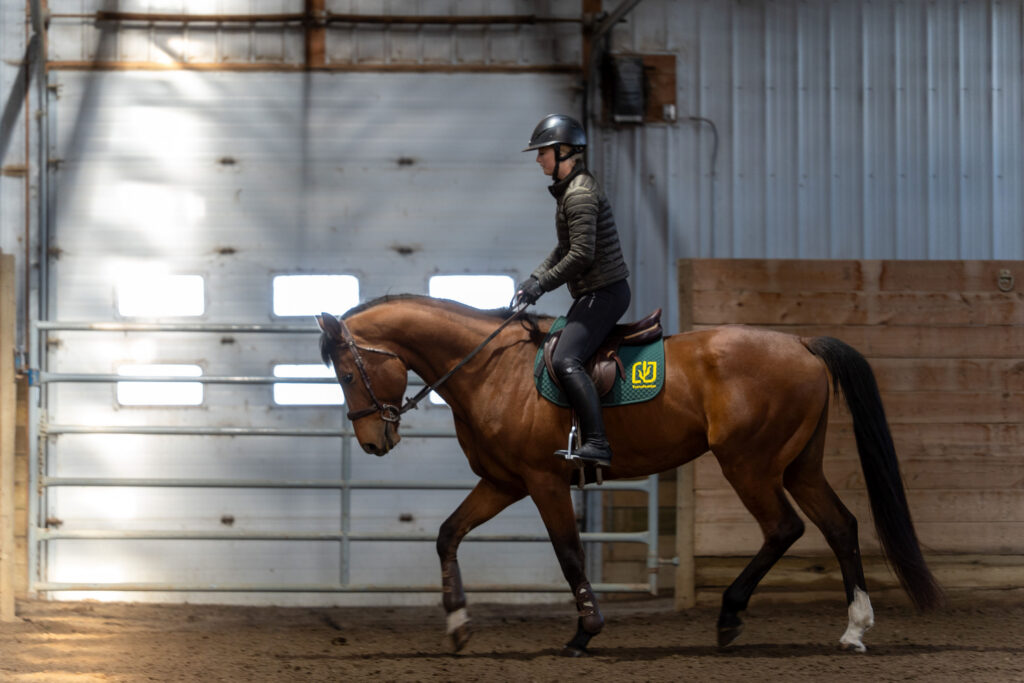 Athlete Riding Horse